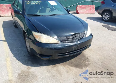 2003 Toyota Camry Le z USA, uszkodzony, nr VIN JTDBE32K730235638